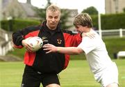 22 June 2004; Bradford Bulls coach Brian Noble gives some tips to Ross Connolly, Blackrock U-20, during a Bradford Bulls training and skills session in the grounds of Blackrock college, Dublin. Picture credit; Brian Lawless / SPORTSFILE