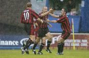 22 June 2004; Tony Grant, centre, Bohemians, celebrates after scoring his sides first goal with team-mates Glen Crowe,left, and Fergal Harkin. eircom League Premier Division, Cork City v Bohemians, Turners Cross, Cork. Picture credit; David Maher / SPORTSFILE