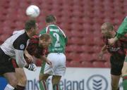 22 June 2004; Tony Grant, far right, Bohemians , heads the ball past Cork City goalkeeper Michael Devine and Danny Murphy to score his sides first goal. eircom League Premier Division, Cork City v Bohemians, Turners Cross, Cork. Picture credit; David Maher / SPORTSFILE