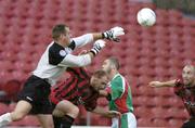 22 June 2004; Tony Grant, far right, Bohemians, heads the ball past Cork City goalkeeper Michael Devine and Danny Murphy to score his sides first goal. eircom League Premier Division, Cork City v Bohemians, Turners Cross, Cork. Picture credit; David Maher / SPORTSFILE