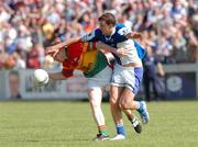30 May 2004; John Hayden, Carlow, in action against Paul McDonald, Laois. Bank of Ireland Leinster Senior Football Championship, Carlow v Laois, Dr. Cullen Park, Carlow. Picture credit; David Maher / SPORTSFILE