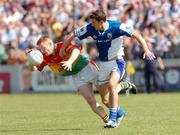 30 May 2004; John Hayden, Carlow, in action against Paul McDonald, Laois. Bank of Ireland Leinster Senior Football Championship, Carlow v Laois, Dr. Cullen Park, Carlow. Picture credit; David Maher / SPORTSFILE