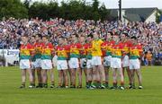 30 May 2004; The Carlow team stand for the national anthem. Bank of Ireland Leinster Senior Football Championship, Carlow v Laois, Dr. Cullen Park, Carlow. Picture credit; David Maher / SPORTSFILE