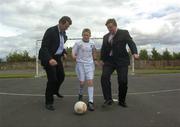 24 June 2004; At the announcement of the allocation of 2 million euro from the Irish Sports Council to the F.A.I. for 2004 aimed at supporting their overall Development Programme were Packie Bonner, left, Technical Director of the FAI, Fran Rooney, right, Chief Executive of the F.A.I., and Shaun Monney who took part in the FAI / Dublin Bus Futsal Programme. O'Devaney Gardens, Dublin. Picture credit; Damien Eagers / SPORTSFILE