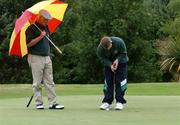 24 June 2004; Patrick and Brian Kavanagh, Connaught, pictured on the 18th green. All Ireland Special Olympics Golf Finals, Harbour Point Golf Course, Little Island, Cork. Golf. Picture credit; Gerard McCarthy
