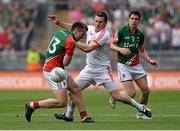 25 August 2013; Cillian O'Connor, Mayo, reacts after colliding with Conor Gormley, Tyrone. GAA Football All-Ireland Senior Championship Semi-Final, Mayo v Tyrone, Croke Park, Dublin. Picture credit: Oliver McVeigh / SPORTSFILE