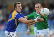 29 June 2013; Michael Brady, Longford, in action against Sterphen Lavin, Limerick. GAA Football All Ireland Senior Championship, Round 1, Longford v Limerick, Pearse Park, Longford. Picture credit: Ray Lohan / SPORTSFILE