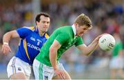 29 June 2013; Johnny McCarthy, Limerick, in action against Paul Barden, Longford. GAA Football All Ireland Senior Championship, Round 1, Longford v Limerick, Pearse Park, Longford. Picture credit: Ray Lohan / SPORTSFILE