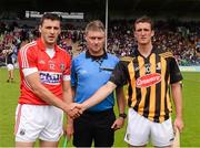 28 July 2013; Kilkenny captain Colin Fennelly and Cork captain Pa Cronin shake hands in front of referee Barry Kelly. GAA Hurling All-Ireland Senior Championship, Quarter-Final, Cork v Kilkenny, Semple Stadium, Thurles, Co. Tipperary. Picture credit: Ray McManus / SPORTSFILE