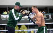 17 May 2023; Paddy Donovan and trainer Andy Lee during public workouts, held at Dundrum Town Centre in Dublin, ahead of his welterweight bout with Sam O'Maison, on May 20th at 3Arena in Dublin. Photo by Stephen McCarthy/Sportsfile