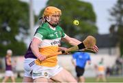 17 May 2023; Cormac Egan of Offaly in action against Seán Rowley of Wexford during the oneills.com Leinster GAA Hurling U20 Championship Final match between Offaly and Wexford at Netwatch Cullen Park in Carlow. Photo by Stephen Marken/Sportsfile