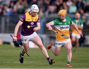 17 May 2023; Michael Dundon of Wexford in action against Cormac Egan of Offaly during the oneills.com Leinster GAA Hurling U20 Championship Final match between Offaly and Wexford at Netwatch Cullen Park in Carlow. Photo by Stephen Marken/Sportsfile