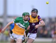 17 May 2023; Adam Screeney of Offaly in action against Eoin Whelan of Wexford during the oneills.com Leinster GAA Hurling U20 Championship Final match between Offaly and Wexford at Netwatch Cullen Park in Carlow. Photo by Stephen Marken/Sportsfile