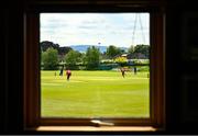 18 May 2023; Mark Donegan of Leinster Lightning is seen batting through a clubhouse window during the Rario Inter-Provincial Cup match between Leinster Lightning and Munster Reds at Pembroke Cricket Club in Dublin. Photo by Tyler Miller/Sportsfile