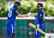 18 May 2023; Barry McCarthy of Leinster Lightning, left, and Mark Donegan during the Rario Inter-Provincial Cup match between Leinster Lightning and Munster Reds at Pembroke Cricket Club in Dublin. Photo by Tyler Miller/Sportsfile