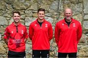 18 May 2023; Munster players, Curtis Campher, left, and PJ Moor, centre, and Munster Reds head coach Jeremy Bray pose for a portrait during the Rario Inter-Provincial Cup match between Leinster Lightning and Munster Reds at Pembroke Cricket Club in Dublin. Photo by Tyler Miller/Sportsfile