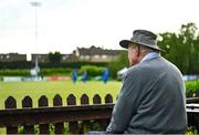 18 May 2023; A spectator watches on during the Rario Inter-Provincial Cup match between Leinster Lightning and Munster Reds at Pembroke Cricket Club in Dublin. Photo by Tyler Miller/Sportsfile