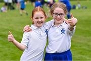 19 May 2023; Abi Gormley, left, and Maeve Moran of Our Lady of the Wayside, Kilternan, during the Leinster Rugby DLR Region Primary School Blitz at Stillorgan Rathfarnham RFC in Dublin. Photo by Piaras Ó Mídheach/Sportsfile