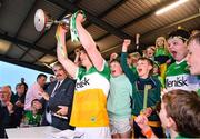 17 May 2023; Offaly captain Charlie Mitchell lifts the cup after his side's victory in the oneills.com Leinster GAA Hurling U20 Championship Final match between Offaly and Wexford at Netwatch Cullen Park in Carlow. Photo by Piaras Ó Mídheach/Sportsfile