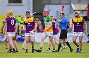 17 May 2023; Charlie Mitchell of Offaly is shown the red card by referee Thomas Gleeson during the oneills.com Leinster GAA Hurling U20 Championship Final match between Offaly and Wexford at Netwatch Cullen Park in Carlow. Photo by Piaras Ó Mídheach/Sportsfile