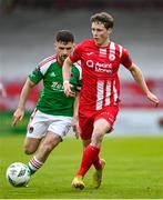 19 May 2023; Will Fitzgerald of Sligo Rovers in action against Aaron Bolger of Cork City during the SSE Airtricity Men's Premier Division match between Cork City and Sligo Rovers at Turner's Cross in Cork. Photo by Stephen Marken/Sportsfile