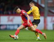 19 May 2023; Matty Smith of Shelbourne in action against Jamie Lennon of St Patrick's Athletic during the SSE Airtricity Men's Premier Division match between Shelbourne and St Patrick's Athletic at Tolka Park in Dublin. Photo by Stephen McCarthy/Sportsfile