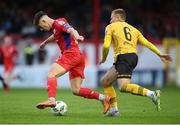 19 May 2023; Matty Smith of Shelbourne in action against Jamie Lennon of St Patrick's Athletic during the SSE Airtricity Men's Premier Division match between Shelbourne and St Patrick's Athletic at Tolka Park in Dublin. Photo by Stephen McCarthy/Sportsfile