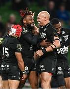 19 May 2023; Waisea Vuidravuwalu of RC Toulon celebrates with teammate Sergio Parisse after scoring his side's fifth try during the EPCR Challenge Cup Final match between Glasgow Warriors and RC Toulon at the Aviva Stadium in Dublin. Photo by Harry Murphy/Sportsfile
