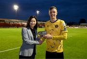 19 May 2023; Chris Forrester of St Patrick's Athletic is presented with the man of the match award by Clarie Murphy, head of fundraising and partnerships, LGBT Ireland, a part of SSE Airtricity's LGBT Ireland Football takeover initiative, during the SSE Airtricity Men's Premier Division match between Shelbourne and St Patrick's Athletic at Tolka Park in Dublin. Photo by Stephen McCarthy/Sportsfile
