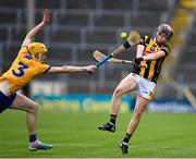 20 May 2023; Conor Doyle of Kilkenny in action against Ronan Keane of Clare during the Electric Ireland GAA Hurling All-Ireland Minor Championship Semi-Final match between Clare and Kilkenny at FBD Semple Stadium in Thurles, Tipperary. Photo by Stephen Marken/Sportsfile