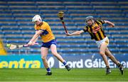 20 May 2023; Ógie Fanning of Clare in action against Rory Garrett of Kilkenny during the Electric Ireland GAA Hurling All-Ireland Minor Championship Semi-Final match between Clare and Kilkenny at FBD Semple Stadium in Thurles, Tipperary. Photo by Stephen Marken/Sportsfile