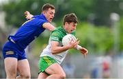 20 May 2023; Conor O'Donnell of Donegal is tackled by Darragh Bohannon of Clare during the GAA Football All-Ireland Senior Championship Round 1 match between Clare and Donegal at Cusack Park in Ennis, Clare. Photo by Ray McManus/Sportsfile