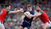 20 May 2023; Dylan Casey of Kerry in action against Diarmuid O’Connor, left, and Aidan O'Shea of Mayo during the GAA Football All-Ireland Senior Championship Round 1 match between Kerry and Mayo at Fitzgerald Stadium in Killarney, Kerry. Photo by Piaras Ó Mídheach/Sportsfile