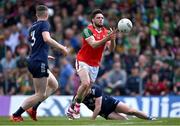 20 May 2023; Pádraig O’Hora of Mayo handpasses the ball over the bar to score a point during the GAA Football All-Ireland Senior Championship Round 1 match between Kerry and Mayo at Fitzgerald Stadium in Killarney, Kerry. Photo by Piaras Ó Mídheach/Sportsfile