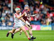 20 May 2023; David O'Leary of Cork in action against Brian Callanan of Galway during the Electric Ireland GAA Hurling All-Ireland Minor Championship Semi-Final match between Galway and Cork at FBD Semple Stadium in Thurles, Tipperary. Photo by Stephen Marken/Sportsfile