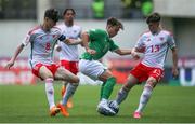 20 May 2023; Najemedine Razi of Republic of Ireland in action against Charles Crew, left, and Samuel Parker of Wales during the UEFA European U17 Championship Final Tournament match between Republic of Ireland and Wales at Pancho Aréna in Felcsút, Hungary. Photo by David Balogh/Sportsfile
