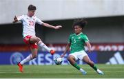 20 May 2023; Jake Grante of Republic of Ireland in action against Troy Perrett of Wales during the UEFA European U17 Championship Final Tournament match between Republic of Ireland and Wales at Pancho Aréna in Felcsút, Hungary. Photo by David Balogh/Sportsfile