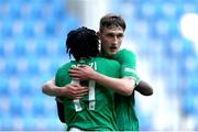20 May 2023; Ikechukwu Orazi of Republic of Ireland, left, is congratulated by teammate Mason Melia after winning a penalty during the UEFA European U17 Championship Final Tournament match between Republic of Ireland and Wales at Pancho Aréna in Felcsút, Hungary. Photo by David Balogh/Sportsfile