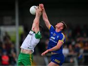 20 May 2023; Caolan McGonagle of Donegal in action against Darragh Bohannon of Clare during the GAA Football All-Ireland Senior Championship Round 1 match between Clare and Donegal at Cusack Park in Ennis, Clare. Photo by Ray McManus/Sportsfile