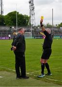 20 May 2023; Donegal manager Aidan O'Rourke is spoken to by referee James Molloy as he is issued a yellow card during the GAA Football All-Ireland Senior Championship Round 1 match between Clare and Donegal at Cusack Park in Ennis, Clare. Photo by Ray McManus/Sportsfile