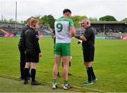 20 May 2023; Rory O'Donnell of Donegal is spoken to by referee James Molloy before being issued a yellow card for taking off his jersey during the GAA Football All-Ireland Senior Championship Round 1 match between Clare and Donegal at Cusack Park in Ennis, Clare. Photo by Ray McManus/Sportsfile