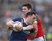 20 May 2023; Paudie Clifford of Kerry in action against Conor Loftus of Mayo during the GAA Football All-Ireland Senior Championship Round 1 match between Kerry and Mayo at Fitzgerald Stadium in Killarney, Kerry. Photo by Piaras Ó Mídheach/Sportsfile