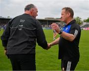 20 May 2023; Clare manager Colm Collins, right, shakes hands with Donegal manager Aidan O'Rourke after the GAA Football All-Ireland Senior Championship Round 1 match between Clare and Donegal at Cusack Park in Ennis, Clare. Photo by Ray McManus/Sportsfile