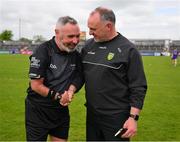 20 May 2023; Referee James Molloy shakes hands with Donegal manager Aidan O'Rourke after the GAA Football All-Ireland Senior Championship Round 1 match between Clare and Donegal at Cusack Park in Ennis, Clare. Photo by Ray McManus/Sportsfile