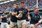 20 May 2023; Dan Sheehan of Leinster, centre, celebrates with teammates after scoring their side's first try in the first minute of the Heineken Champions Cup Final match between Leinster and La Rochelle at Aviva Stadium in Dublin. Photo by Ramsey Cardy/Sportsfile
