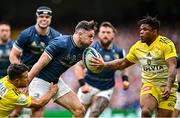 20 May 2023; Hugo Keenan of Leinster is tackled by Brice Dulin, left, and Jonathan Danty of La Rochelle during the Heineken Champions Cup Final match between Leinster and La Rochelle at Aviva Stadium in Dublin. Photo by Ramsey Cardy/Sportsfile