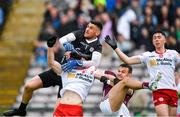 20 May 2023; Galway goalkeeper Connor Gleeson and teammate Cillian McDaid in action against Brian Kennedy of Tyrone during the GAA Football All-Ireland Senior Championship Round 1 match between Galway and Tyrone at Pearse Stadium in Galway. Photo by Ray Ryan/Sportsfile