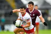 20 May 2023; Darren McCurry of Tyrone in action against Shane Walsh of Galway during the GAA Football All-Ireland Senior Championship Round 1 match between Galway and Tyrone at Pearse Stadium in Galway. Photo by Ray Ryan/Sportsfile