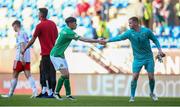 20 May 2023; Republic of Ireland players Cory O'Sullivan, left, and goalkeeper Jason Healy after their side's victory in the UEFA European U17 Championship Final Tournament match between Republic of Ireland and Wales at Pancho Aréna in Felcsút, Hungary. Photo by David Balogh/Sportsfile