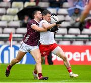 20 May 2023; Matthew Donnelly of Tyrone in action against Damien Comer of Galway during the GAA Football All-Ireland Senior Championship Round 1 match between Galway and Tyrone at Pearse Stadium in Galway. Photo by Ray Ryan/Sportsfile